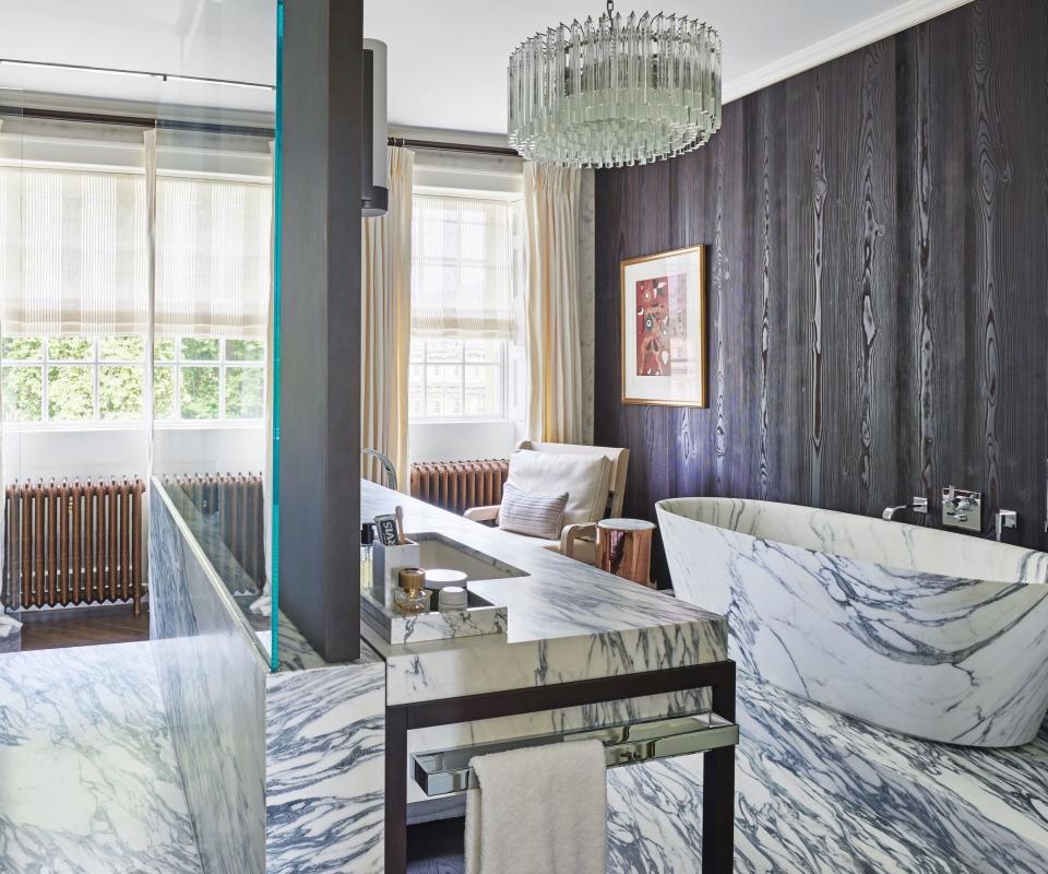 Bathroom with marble and ebonized wood