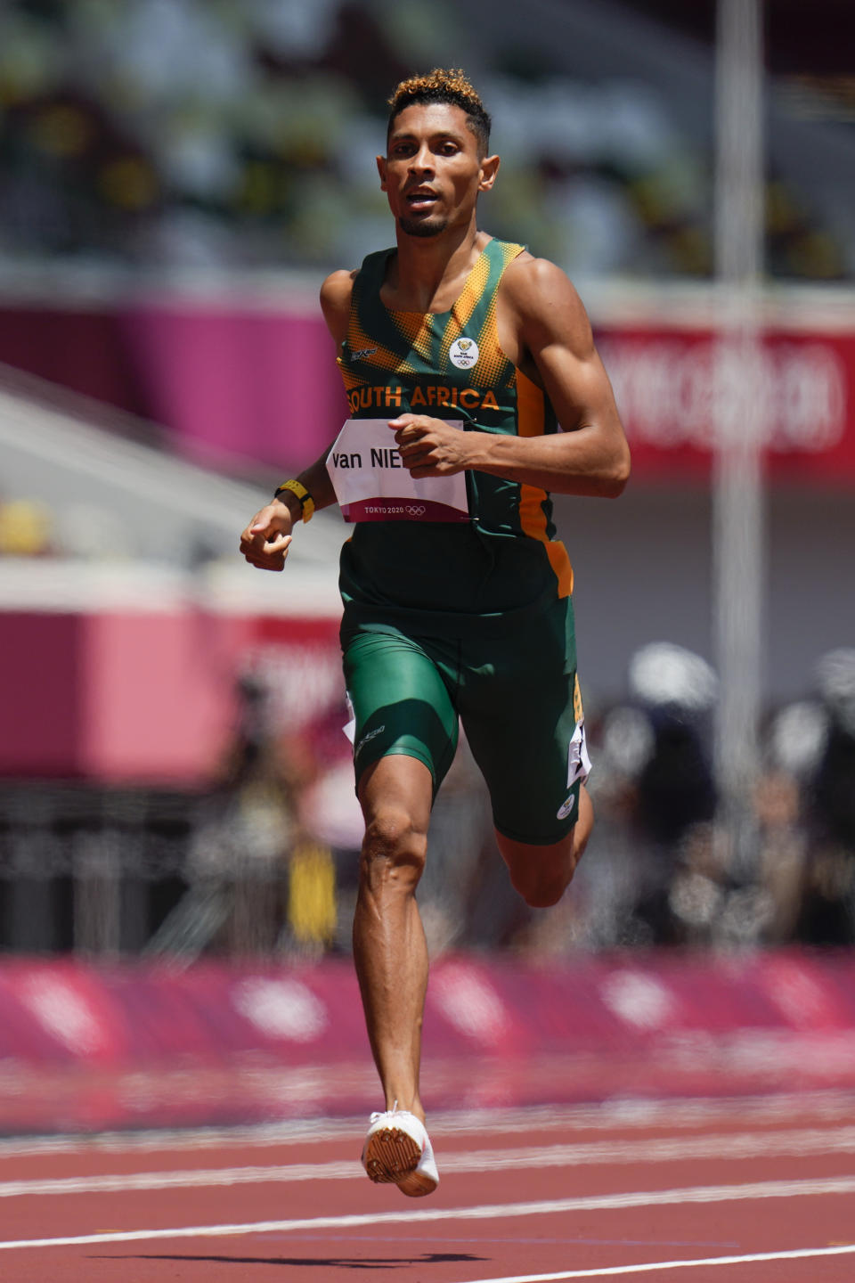 Wayde Van Niekerk, of South Africa, runs in a heat in the men's 400-meter run at the 2020 Summer Olympics, Sunday, Aug. 1, 2021, in Tokyo. (AP Photo/Petr David Josek)