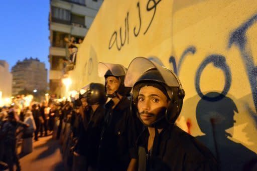 Egyptian riot police stand guard outside the US embassy in Cairo on September 11. An armed mob protesting over a film deemed offensive to Islam attacked the US consulate in Benghazi killing an American, hours after angry Islamists stormed Washington's embassy in Cairo