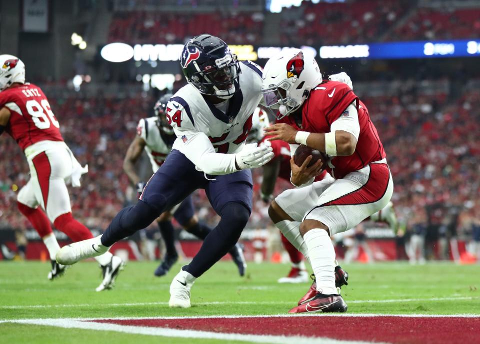 Oct 24, 2021; Glendale, Arizona, USA; Arizona Cardinals quarterback Kyler Murray (1) is tackled by Houston Texans defensive end Jacob Martin (54) for a safety in the first half at State Farm Stadium.