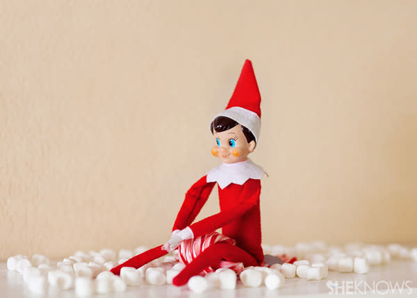 Elf on the Shelf idea 21: Elfie Rojo rides a candy cane sled