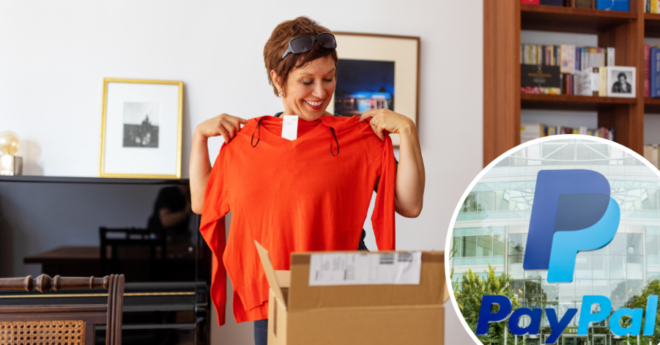 A woman holds up her online purchase and the PayPal logo in the corner.