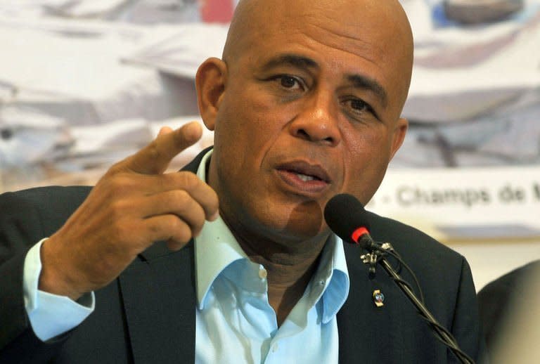 Haitian President Michel Martelly addresses a press conference January 11, 2013 in Port-au-Prince. Three years after Haiti was devastated by a massive earthquake, hundreds of thousands of homeless people are still at risk from crime, disease and the elements in crowded makeshift camps