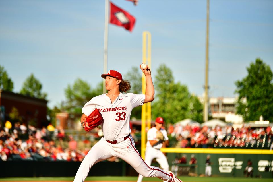 Arkansas baseball's Hagen Smith fires a pitch in the first inning of the Razorbacks' game against Mississippi State Friday, May 10, 2024.