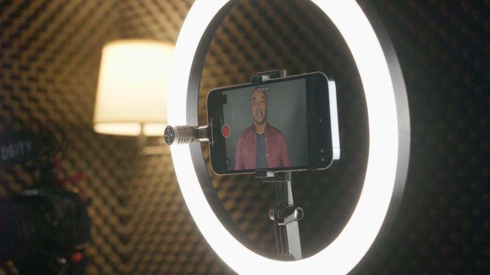 Actor DaJuan Johnson's self-tape setup, complete with an external ("shotgun") microphone attached to his phone.