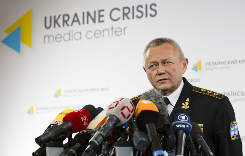 Ukrainian Defence Minister Ihor Tenyukh speaks during a news conference at a hotel in Kiev, Ukraine, Monday, March 17, 2014. Ukraine's defence minister said on Monday that his country is "fully prepared" to deal with Russia's military presence along its eastern, southern and northern borders. (AP Photo/David Azia)