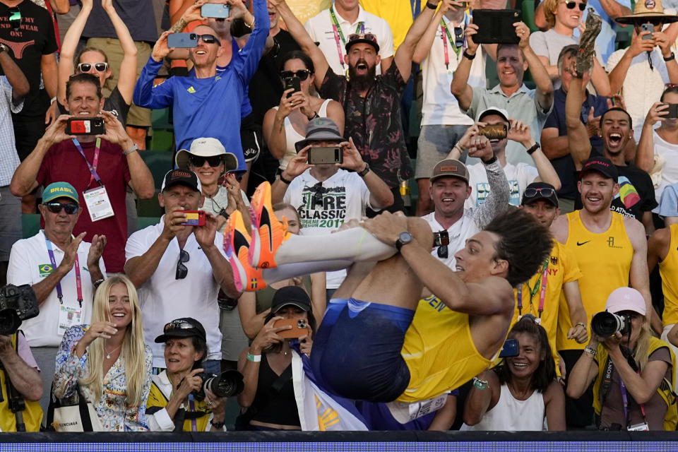 FILE - Armand "Mondo" Duplantis, of Sweden, celebrates after setting a world record in the men's pole vault final at the World Athletics Championships on July 24, 2022, in Eugene, Ore. World-record setters Duplantis and Sydney McLaughlin-Levrone were named World Athletes of the Year on by track's international governing body Monday, Dec. 5, adding yet another achievement to a remarkable 2022 for both athletes. (AP Photo/Charlie Riedel, File)