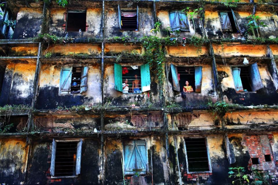 'Survivors' by GMB Akash in Bangladesh. The decreipt building houses eighty families of sweepers, the lowest in the caste system and regarded as 'untouchables' (GMB Akash)