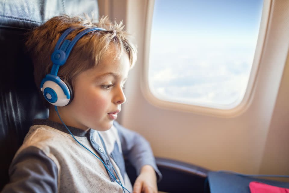 How to keep a kid entertained on a long-haul flight. Photo: Getty Images