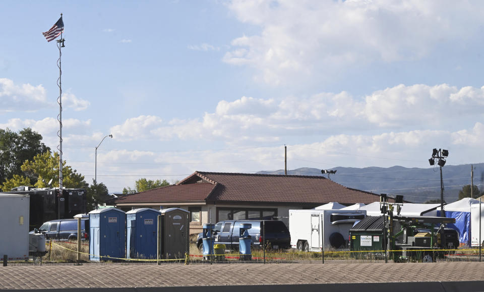 Tents and temporary structures can be seen on Monday, Oct. 9, 2023, at the Return to Nature Funeral Home, where over 100 decomposing bodies were found last week in Penrose, Colo. (Jerilee Bennett/The Gazette via AP)