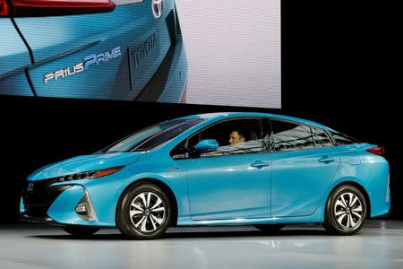 A Toyota Prius Prime is seen during the media preview of the 2016 New York International Auto Show in Manhattan, New York, U.S. March 23, 2016. REUTERS/Brendan McDermid/File photo