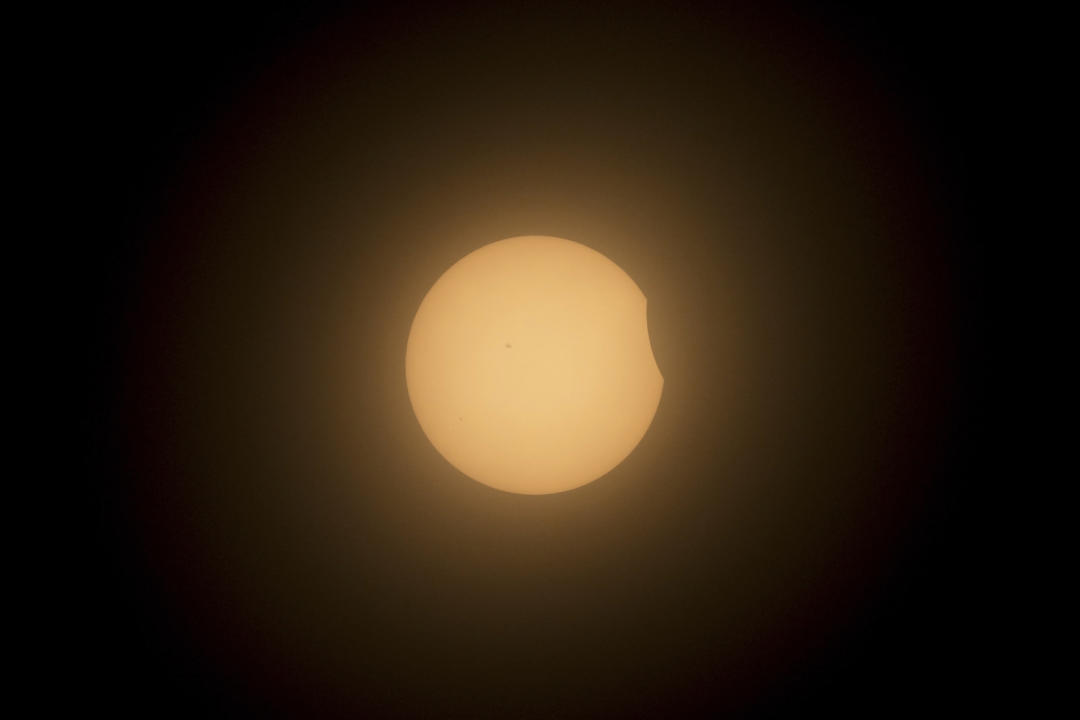 The moon partially covers the sun during a total solar eclipse in Mazatlan, Mexico.