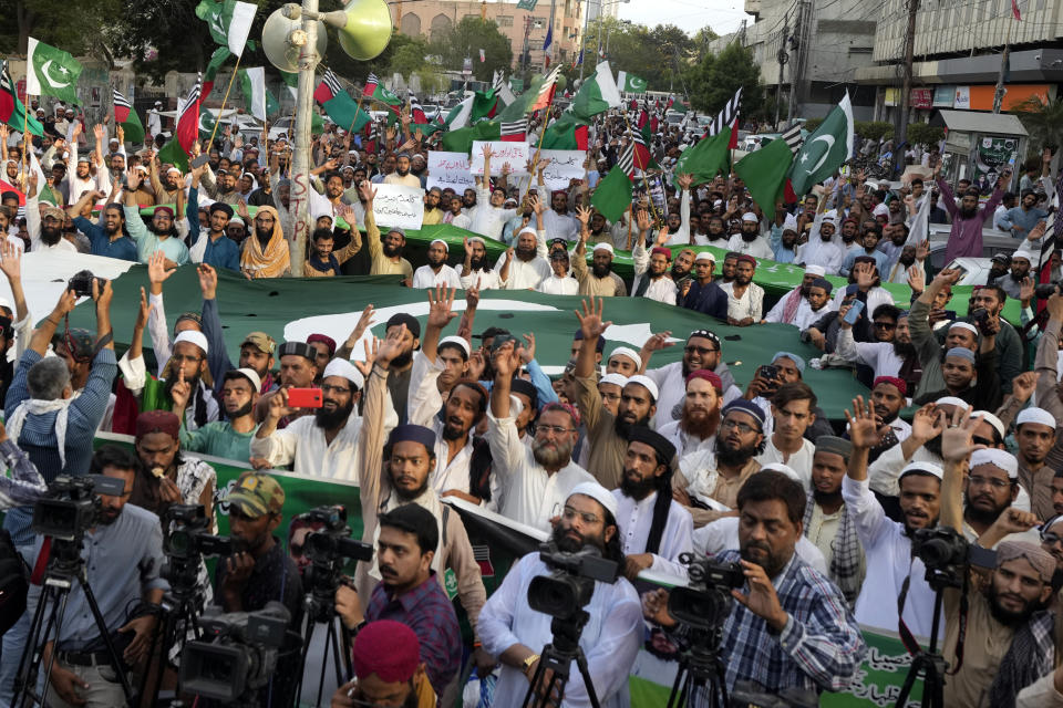 Supporters of Ahle Sunnat Wal Jamaat take part in a rally to show solidarity with Pakistan's army in Karachi, Pakistan, Friday, May 19, 2023. (AP Photo/Fareed Khan)