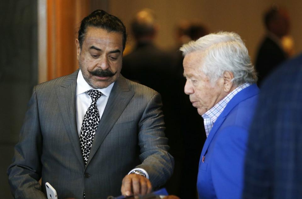 Jacksonville owner Shad Khan, left, and New England owner Robert Kraft will be at the May league meetings next week. (AP)