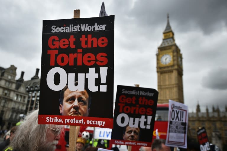 Protesters gather in Parliament Square in central London, on July 8, 2015, as Chancellor of the Exchequer George Osborne unveils fresh austerity measures to slash the country's debt