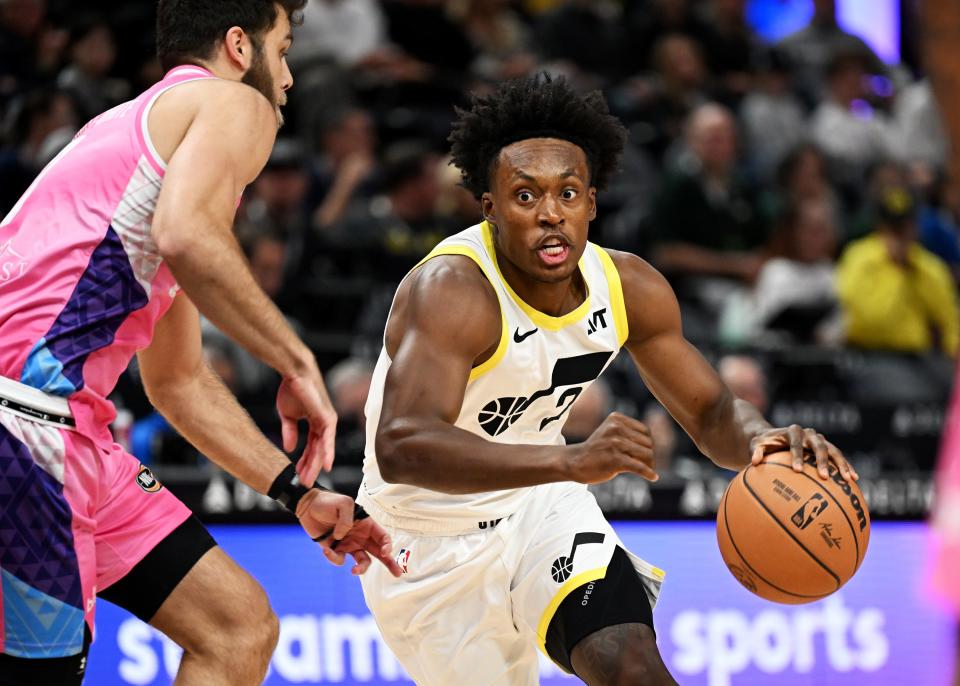 Utah Jazz guard Collin Sexton (2) drives at Breakers’ Will McDowell-White as the Utah Jazz and the New Zealand Breakers play at the Delta Center in Salt Lake City on Monday, Oct. 16, 2023. | Scott G Winterton, Deseret News