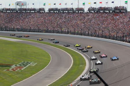 May 29, 2016; Indianapolis, IN, USA; Verizon Indy Car driver James Hinchcliffe leads the field for the start of the 100th running of the Indianapolis 500 at Indianapolis Motor Speedway. Mandatory Credit: Brian Spurlock-USA TODAY Sports