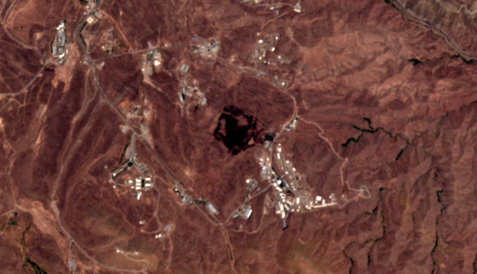 This Friday, June 26, 2020, photo from the European Commission's Sentinel-2 satellite shows the site of an explosion that rattled Iran’s capital. Analysts say the blast came from an area in Tehran’s eastern mountains they hides a underground tunnel system and missile production sites. The explosion appears to have charred hundreds of meters of scrubland. (European Commission via AP)