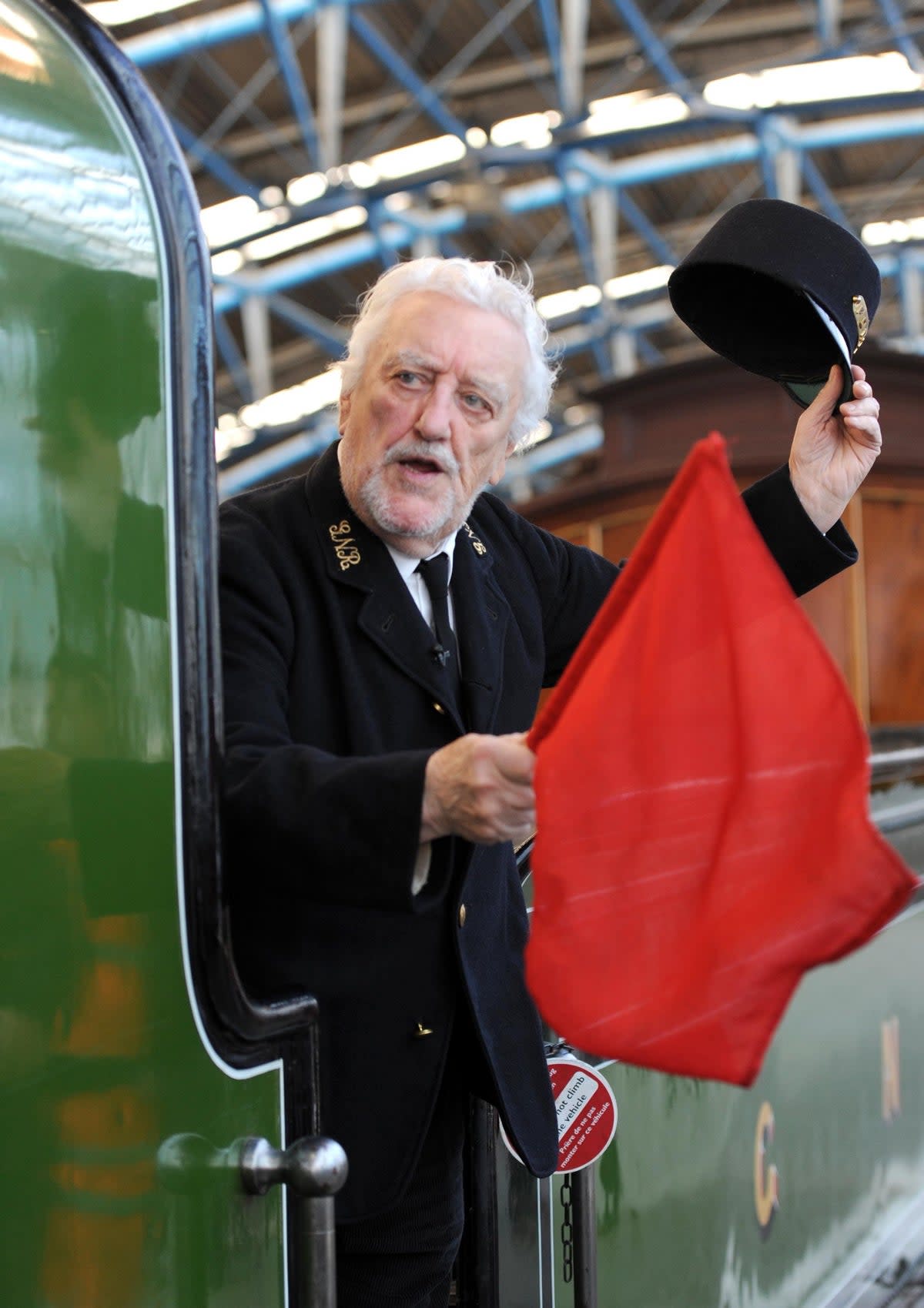 Bernard Cribbins arriving at Waterloo Station, London onboard the 66 tonne Stirling Single, the train used in the original Railway Children film. Veteran actor Bernard Cribbins, who narrated The Wombles and starred in the film adaptation of The Railway Children, has died aged 93, his agent said (Anthony Devlin/PA) (PA Wire)
