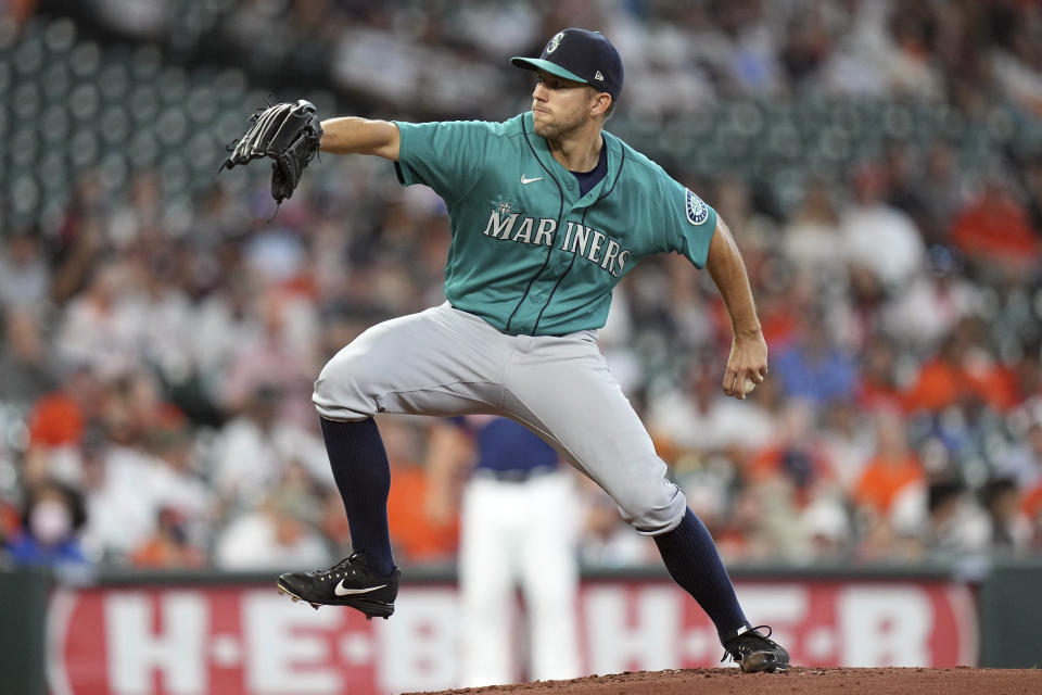 Seattle Mariners starting pitcher Tyler Anderson throws against the Houston Astros during the first inning of a baseball game Sunday, Aug. 22, 2021, in Houston. (AP Photo/David J. Phillip)