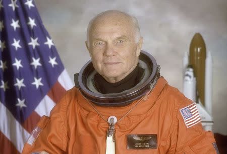STS-95 crewmember, astronaut and U.S. Senator John Glenn poses for his official NASA photo taken April 14, 1998. Glenn was the first American to orbit the earth and returned to space in 1998 aboard the Space Shuttle Discovery. Courtesy NASA/Handout via REUTERS