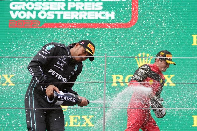 Lewis Hamilton celebrates his third podium finish in as many races 