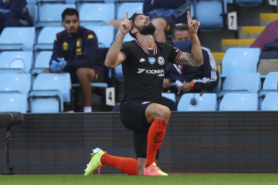 Chelsea's Olivier Giroud celebrates after scoring his side's second goal during the English Premier League soccer match between Aston Villa and Chelsea at the Villa Park stadium in Birmingham, England, Sunday, June 21, 2020. (Justin Tallis/Pool via AP)