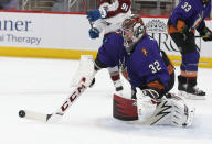 Arizona Coyotes goalie Antti Raanta makes a stick save against the Colorado Avalanche during the third period of an NHL hockey game Saturday, Feb. 27, 2021, in Glendale, Ariz. (AP Photo/Darryl Webb)