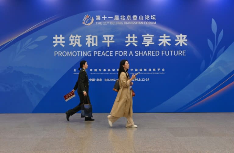 Scores of delegates gathered in the Chinese capital for the Xiangshan defence forum, dubbed China's answer to Singapore's annual "Shangri-La" meeting (ADEK BERRY)