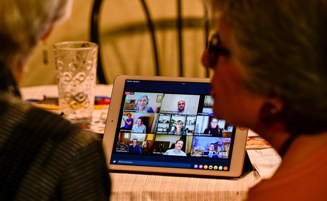 League of Women Voters of Tulare County members Maile Melkonian, right, and Sherri Bentley work behind the scenes on Oct. 5 to produce the virtual Visalia City Council forum.