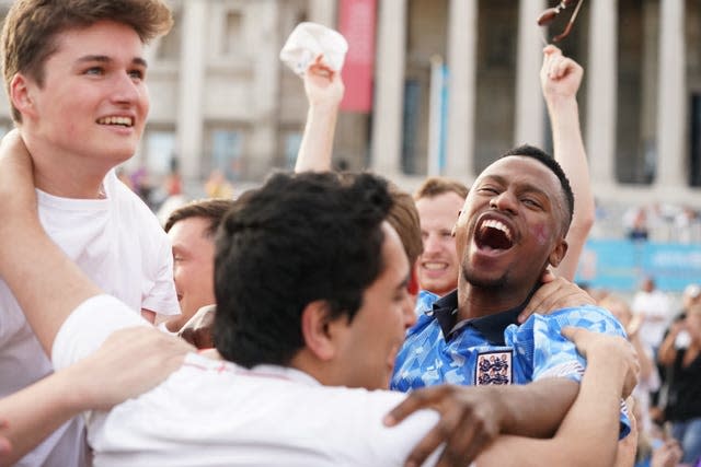 Fans in London celebrate Harry Kane's opening goal against Ukraine