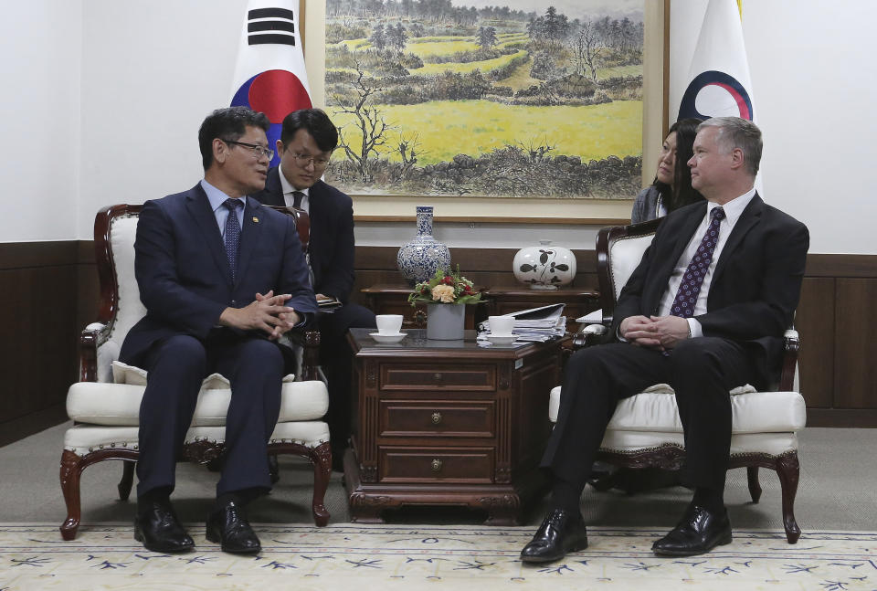 U.S. Special Representative for North Korea Stephen Biegun, right, talks with South Korean Unification Minister Kim Yeon Chul during a meeting at the government complex in Seoul, South Korea, Friday, May 10, 2019. The U.S. and South Korean militaries evaluated the two projectiles North Korea flew Thursday as short-range missiles, a South Korean military official said Friday, a day after the North's second launch in five days raised jitters about an unravelling detente between the Koreas and the future of nuclear negotiations between Washington and Pyongyang. (AP Photo/Ahn Young-joon)
