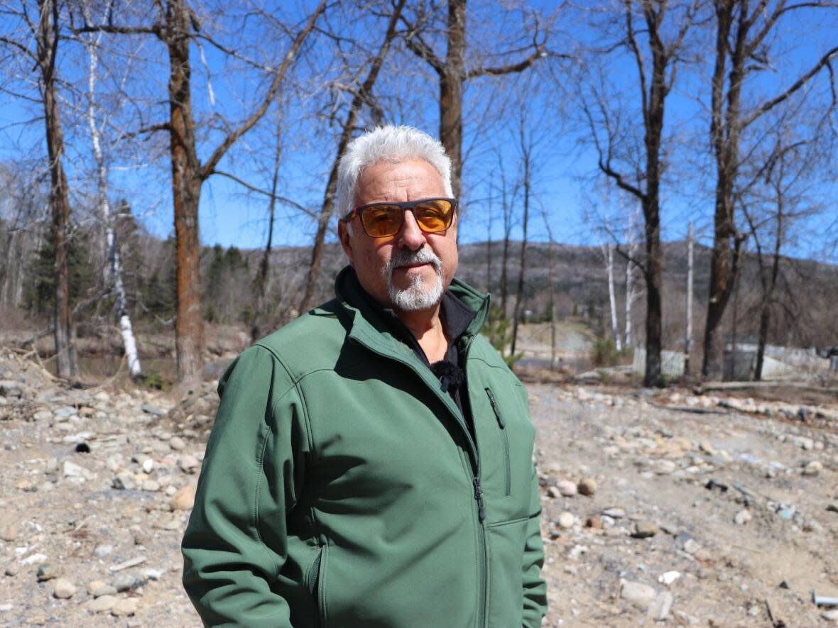 Humberto Pinochet's home where he ran an art gallery was demolished following last year's flooding in Baie-Saint-Paul, Que. (Rachel Watts/CBC - image credit)