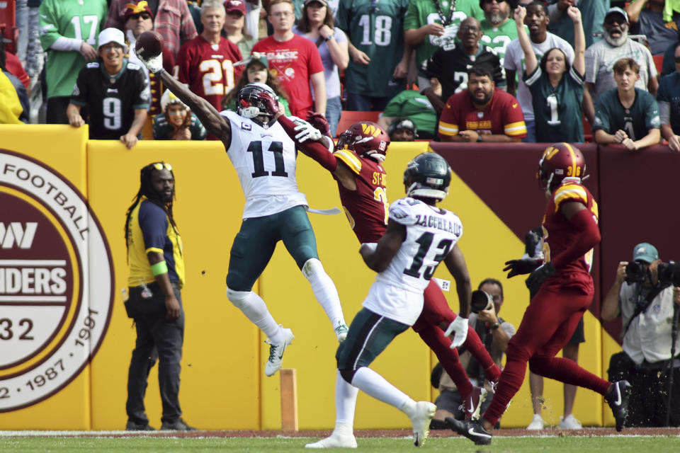 Philadelphia Eagles wide receiver A.J. Brown (11) scores a touchdown during an NFL football game against the Washington Commanders, Sunday, October 29, 2023 in Landover, Maryland. (AP Photo/Daniel Kucin Jr.)