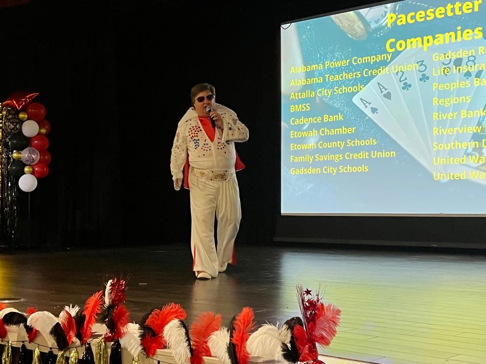 Butch McDonald, imitating "The King," Elvis Presley, fires up the crowd on Aug. 31, 2023, during United Way of Etowah County's campaign kickoff luncheon at The Venue at Coosa Landing.