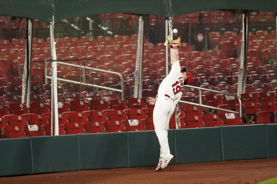 St. Louis Cardinals right fielder Tommy Edman catches a foul ball by Minnesota Twins' Eddie Rosario during the seventh inning in the second game of a baseball doubleheader Tuesday, Sept. 8, 2020, in St. Louis. (AP Photo/Jeff Roberson)