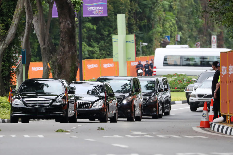 <p>A motorcade carrying North Korean leader Kim Jong Un arrives at the Capella Hotel in Singapore, on Tuesday, June 12, 2018. (Photo: SeongJoon Cho/Bloomberg/Getty Images) </p>