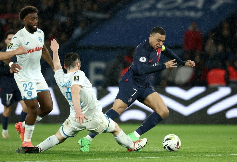 <a class="link " href="https://sports.yahoo.com/soccer/players/3893765/" data-i13n="sec:content-canvas;subsec:anchor_text;elm:context_link" data-ylk="slk:Kylian Mbappe;sec:content-canvas;subsec:anchor_text;elm:context_link;itc:0">Kylian Mbappe</a> (R) in action for Paris Saint-Germain against Le Havre on Saturday (FRANCK FIFE)