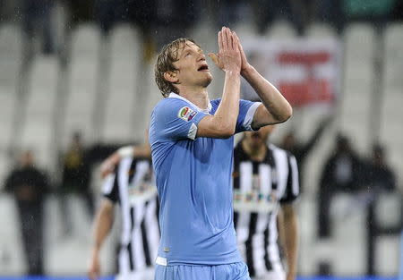 Lazio's Dusan Basta reacts during their Italian Serie A soccer match against Juventus at Juventus Stadium in Turin April 18, 2015. REUTERS/Giorgio Perottino