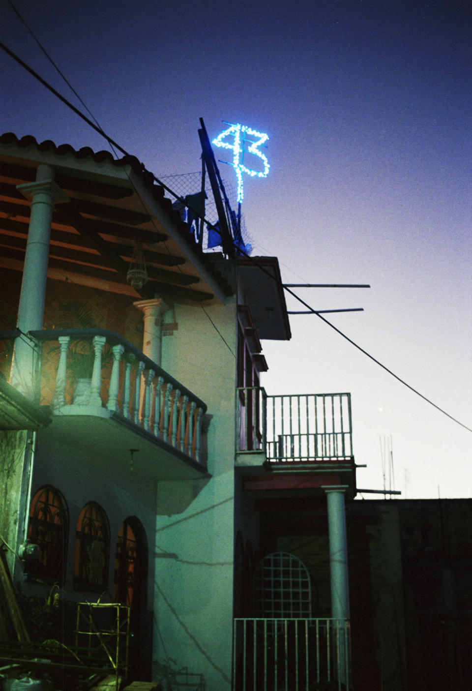 The number "43" lights up a family's rooftop in Tixtla, Guerrero, on Feb. 1, 2015. Tixtla is home to the Ayotzinapa Normal School and 14 of its missing students.