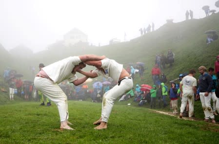 Men fight during the "Hundstoa Ranggeln" at Hundstein mountain near the village of Maria Alm