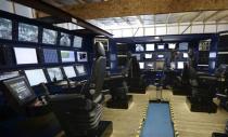 An engineer is seen in the control room being constructed for the subsea mining machines Soil Machine Dynamics (SMD) is building for Nautilus Minerals at Wallsend, northern England April 14, 2014. REUTERS/ Nigel Roddis