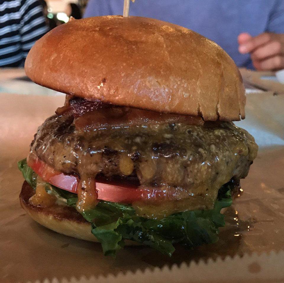<p>At Hopdoddy Burger Bar in Austin, Texas, burgers are put on a pedestal. There’s a variety of specialty burgers, but try the Classic: topped with bacon, tomato, cheese, house “sassy sauce” (a combination of mayo and housemade horseradish honey mustard), onion and red leaf lettuce.</p>