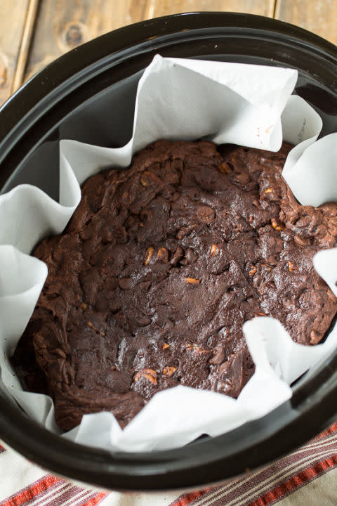 <p>There's nothing like coming home after a long day to the scent of freshly baked brownies.</p><p>Get the recipe from <a rel="nofollow noopener" href="http://spicysouthernkitchen.com/slow-cooker-triple-chocolate-brownies/" target="_blank" data-ylk="slk:Spicy Southern Kitchen;elm:context_link;itc:0;sec:content-canvas" class="link ">Spicy Southern Kitchen</a>.</p>