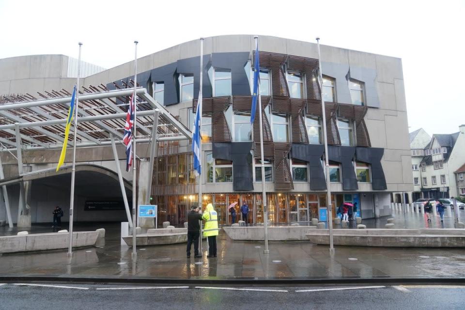 Flags outside Holyrood were lowered to half mast. (Jane Barlow/PA)