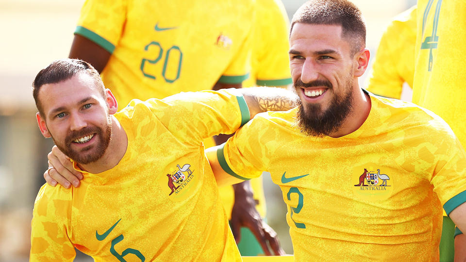 Martin Boyle and Milos Degenek, pictured here during Australia's official team photo for the World Cup.