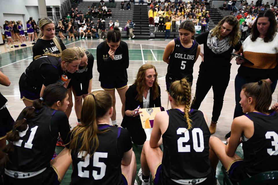 Fort Collins head coach Kerstin Young huddles with the team during a timeout in a girls high school basketball game against Fossil Ridge at Fossil Ridge High School on Tuesday, Jan. 31, 2023 in Fort Collins, Colo.