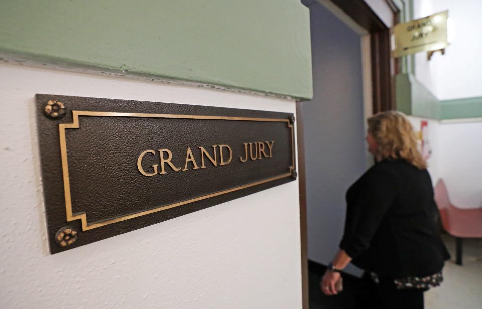 Judge Susan Baker Ross makes her way into the grand jury room at the Summit County Courthouse, Tuesday, March 28, 2023, in Akron, Ohio.