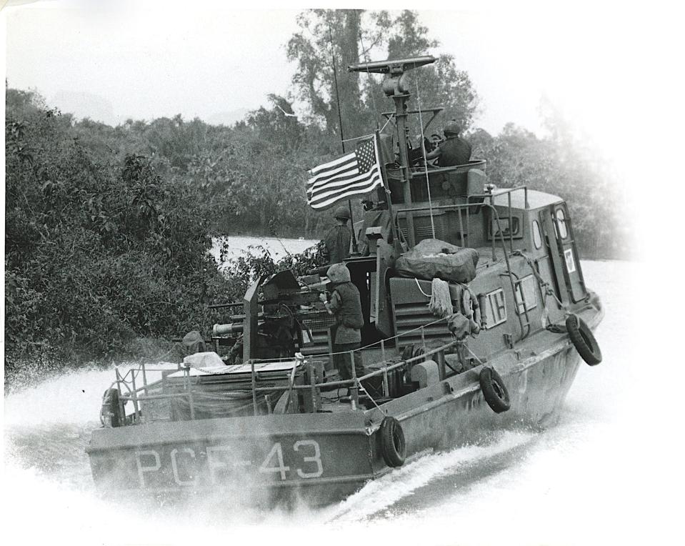 This photo provides a good look at the unusual weapon each Swift Boat had mounted in its stern. The gunner has the option of two weapons. On top is a standard .50-caliber machine gun, but below is a 81 mm mortar. The muzzle-loaded mortar could be trigger-fired if needed.