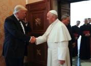 Pope Francis meets U.S. President Donald Trump and his wife Melania during a private audience at the Vatican, May 24, 2017. REUTERS/Alessandra Tarantino/pool